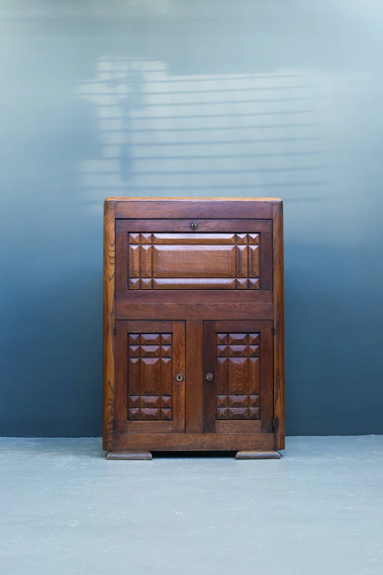 French Art Deco solid oak cabinet in the style of Charles Dudouyt, 1940s