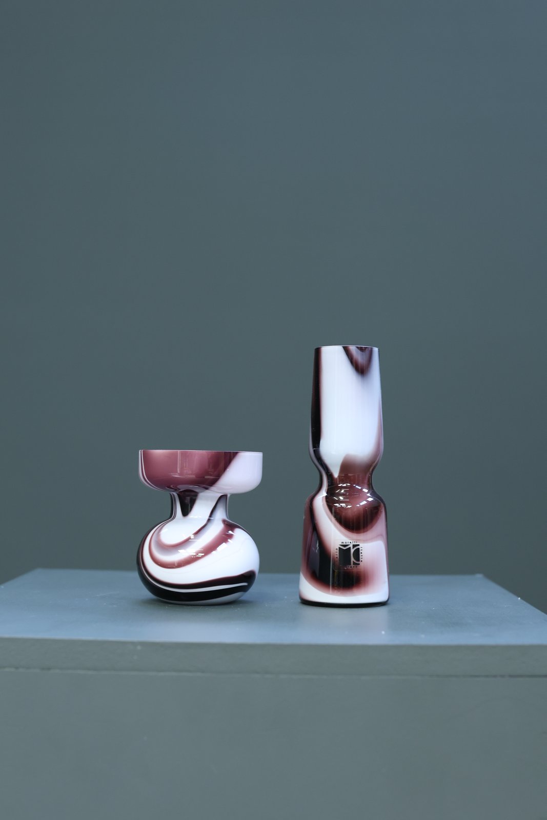 Pair of Carlo Moretti Murano glass vases, white cased glass with deep aubergine swirls, signed Italy