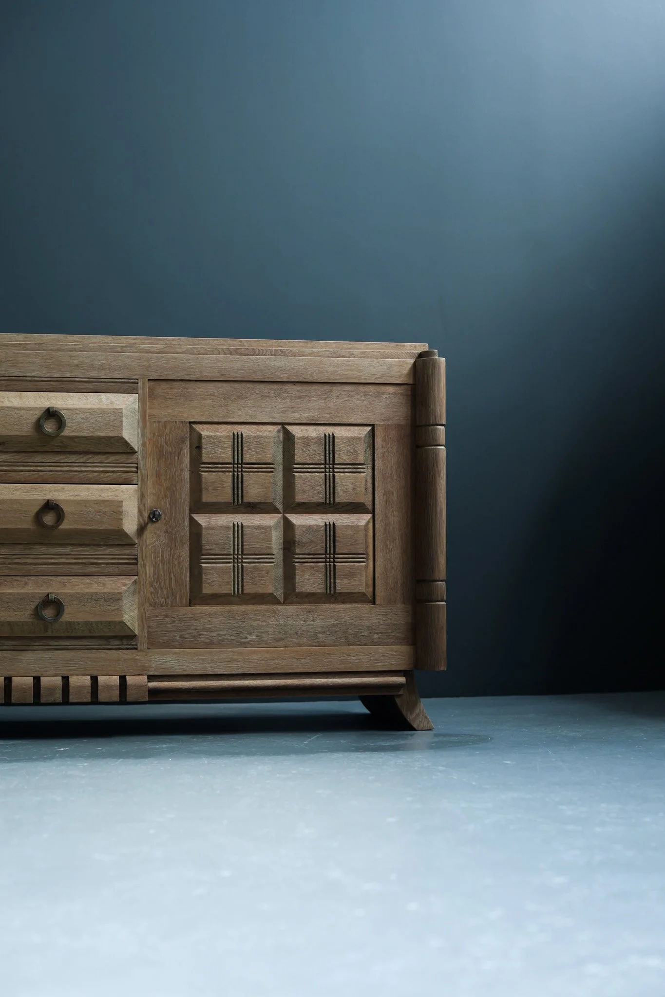 Charles Dudouyt solid oak cabinet with carved details, French, 1950s