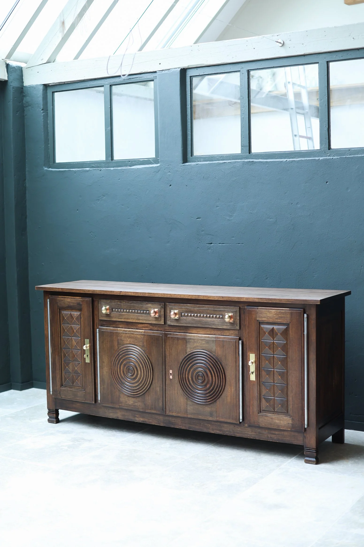 Charles Dudouyt oak credenza with geometric carved panels, French, 1950s