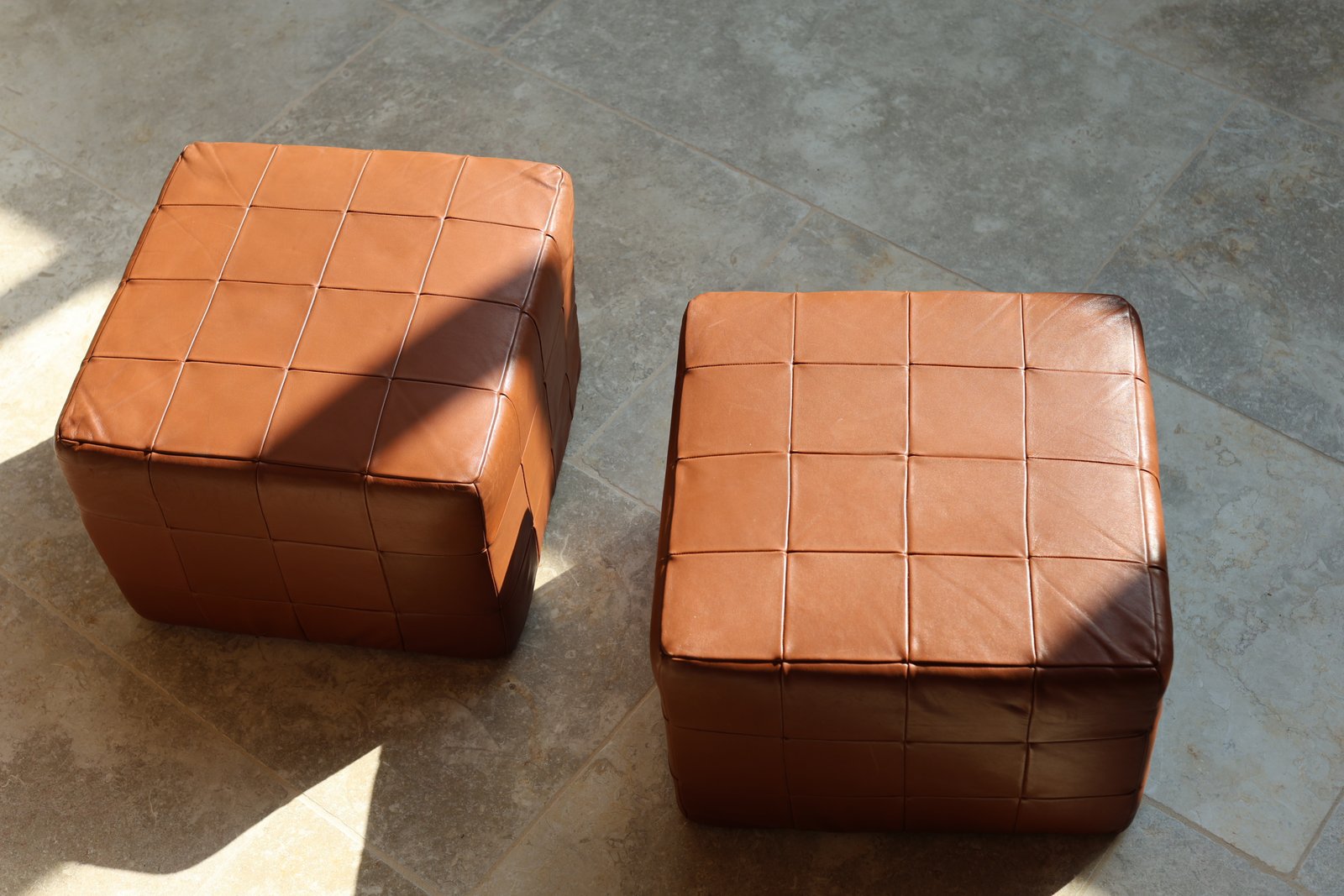 De Sede patchwork leather cube poufs in cognac, set of two, Swiss, 1970s