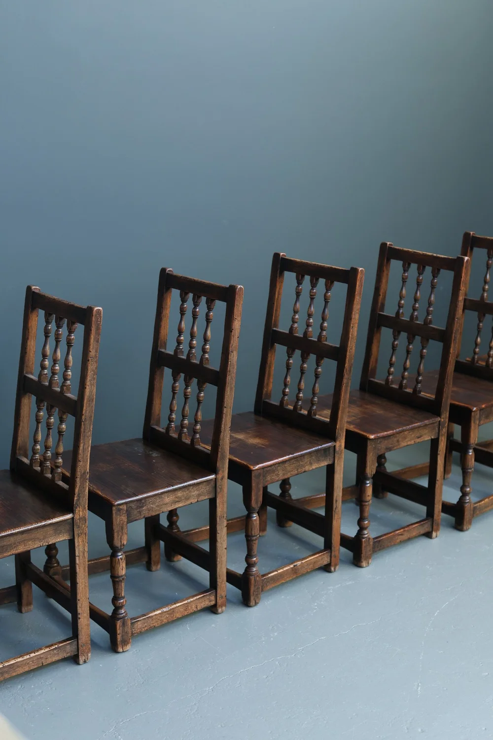 Set of six French 18th-century solid oak side chairs with turned details and authentic patina