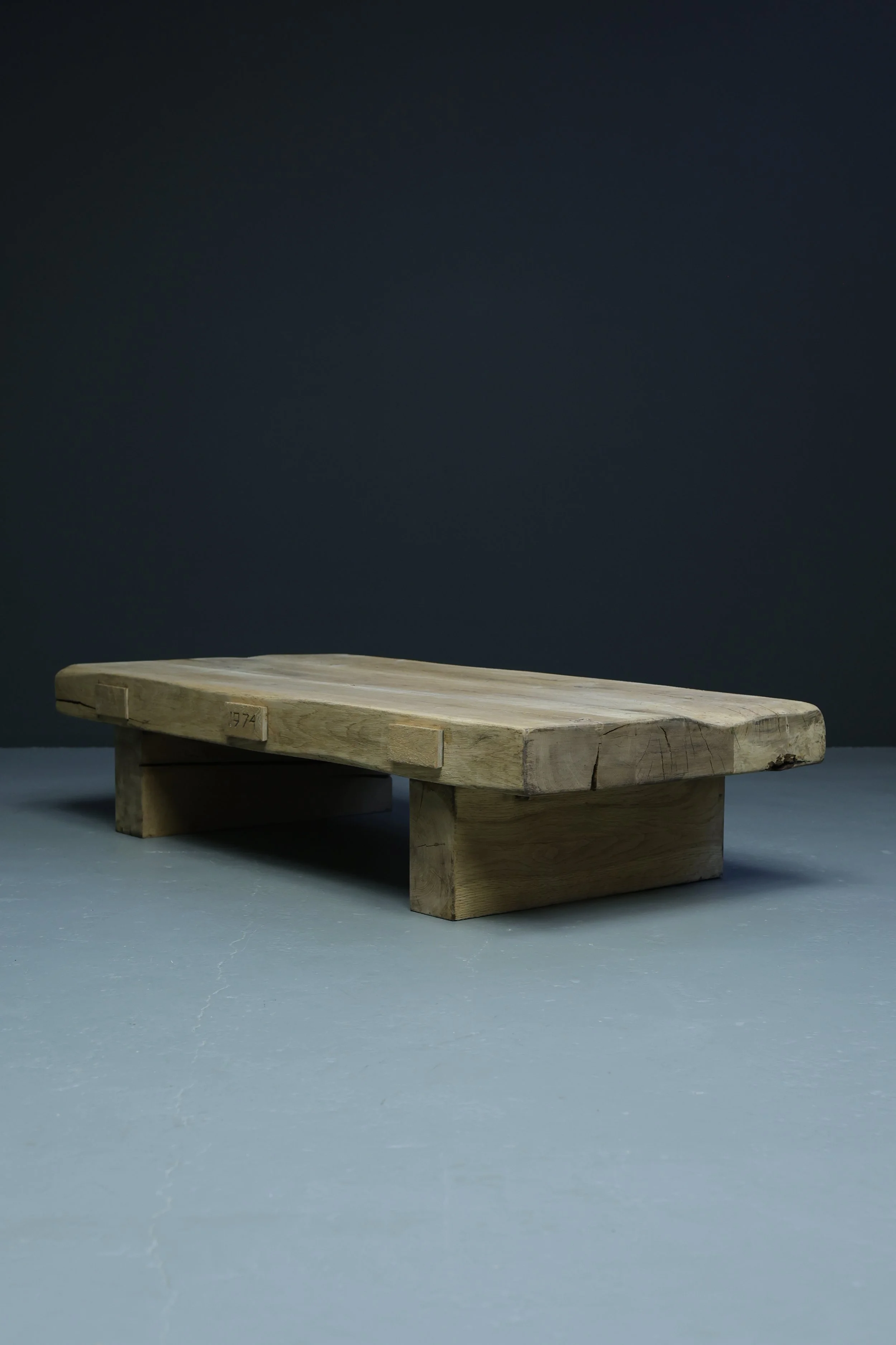 French brutalist oak coffee table with carved date 1974 and engraved initials