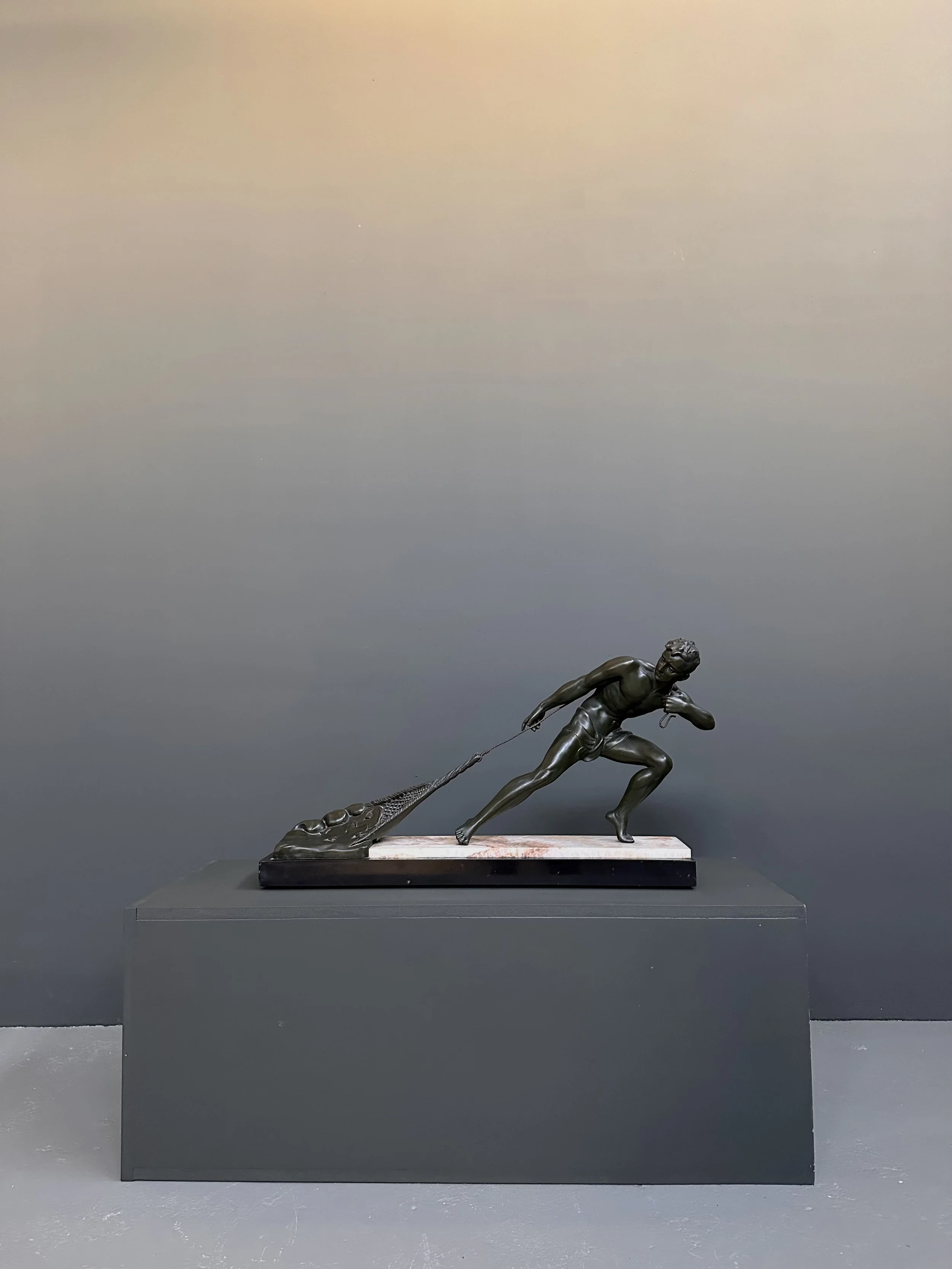 Jean de Roncourt Art Deco bronze fisherman sculpture on marble and bluestone base 1930s France
