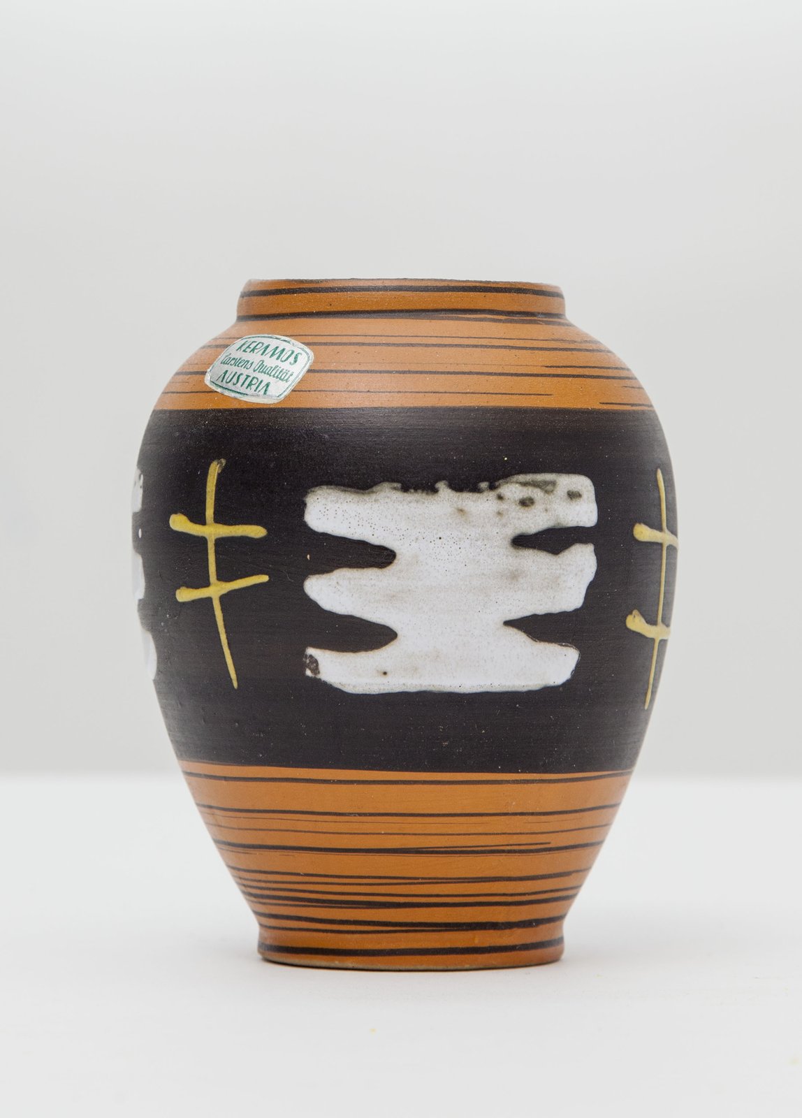 Vintage Keramos Austria mid-century ceramic vase, terracotta bands with black panel and abstract white and yellow decoration, 1960s