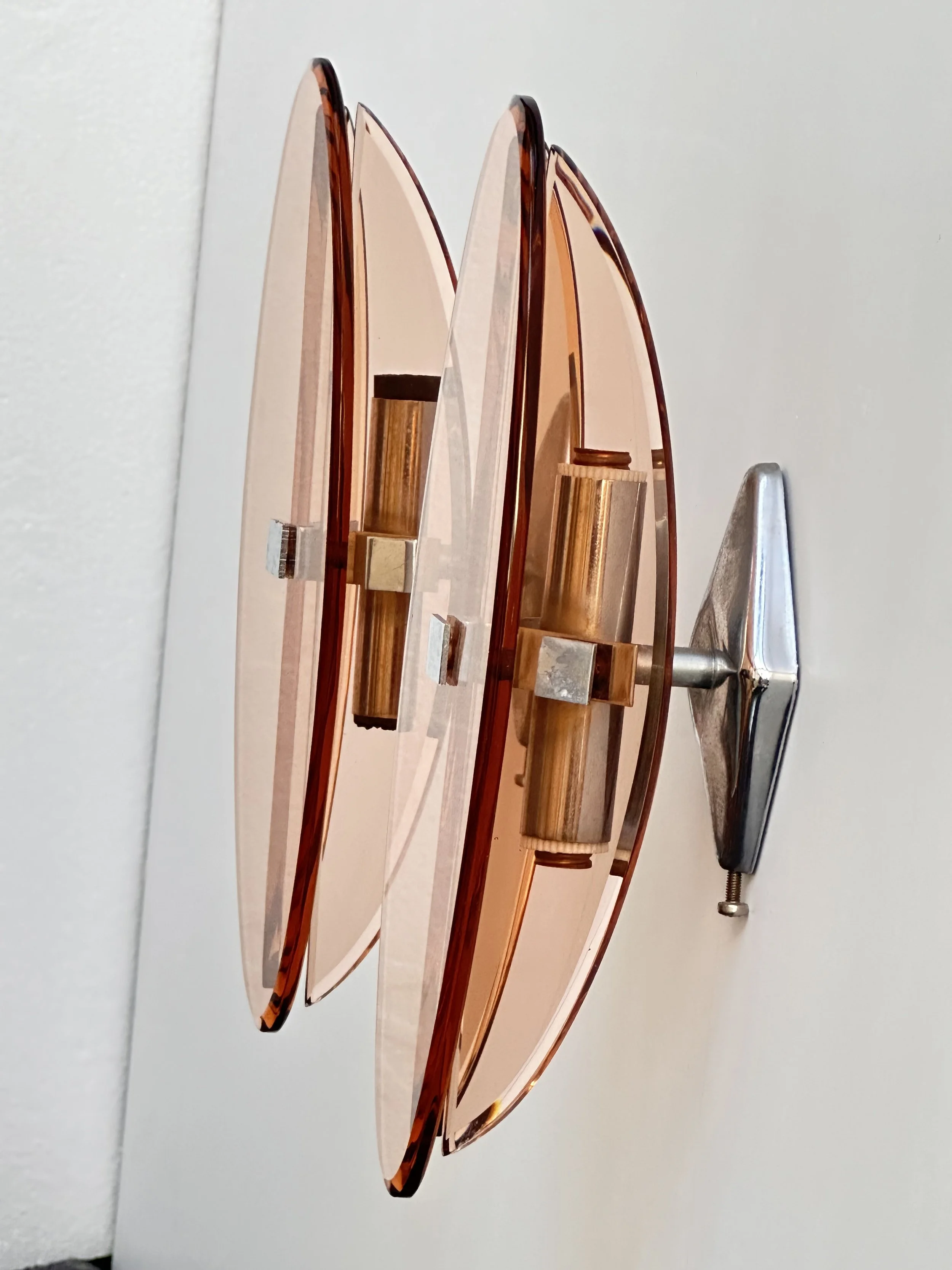 Pair of Veca wall sconces in pink Murano glass with oval disc design, 1970s Italy