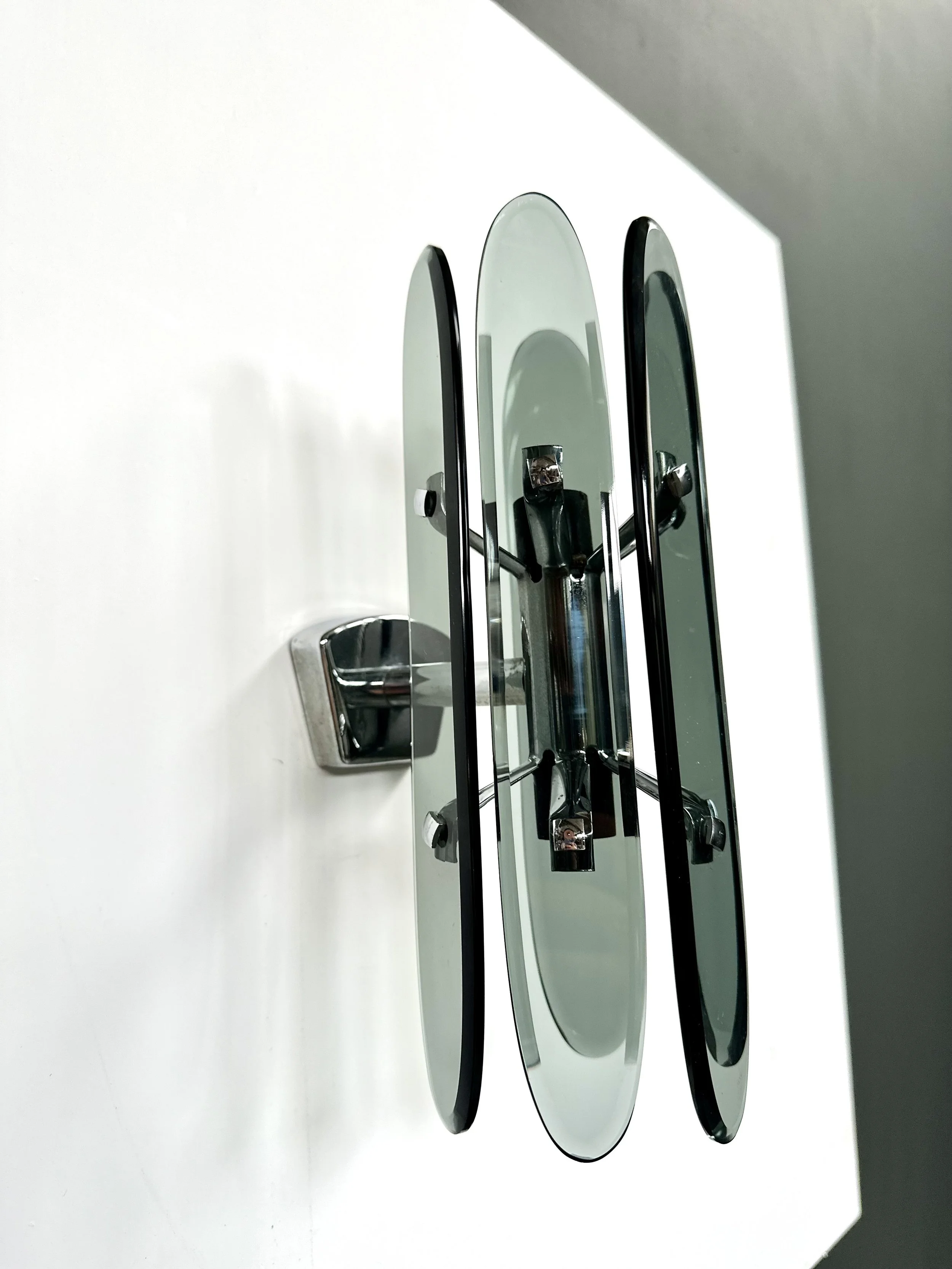 Pair of Veca wall sconces in smokey grey Murano glass, five oval discs, 1970s Italian design