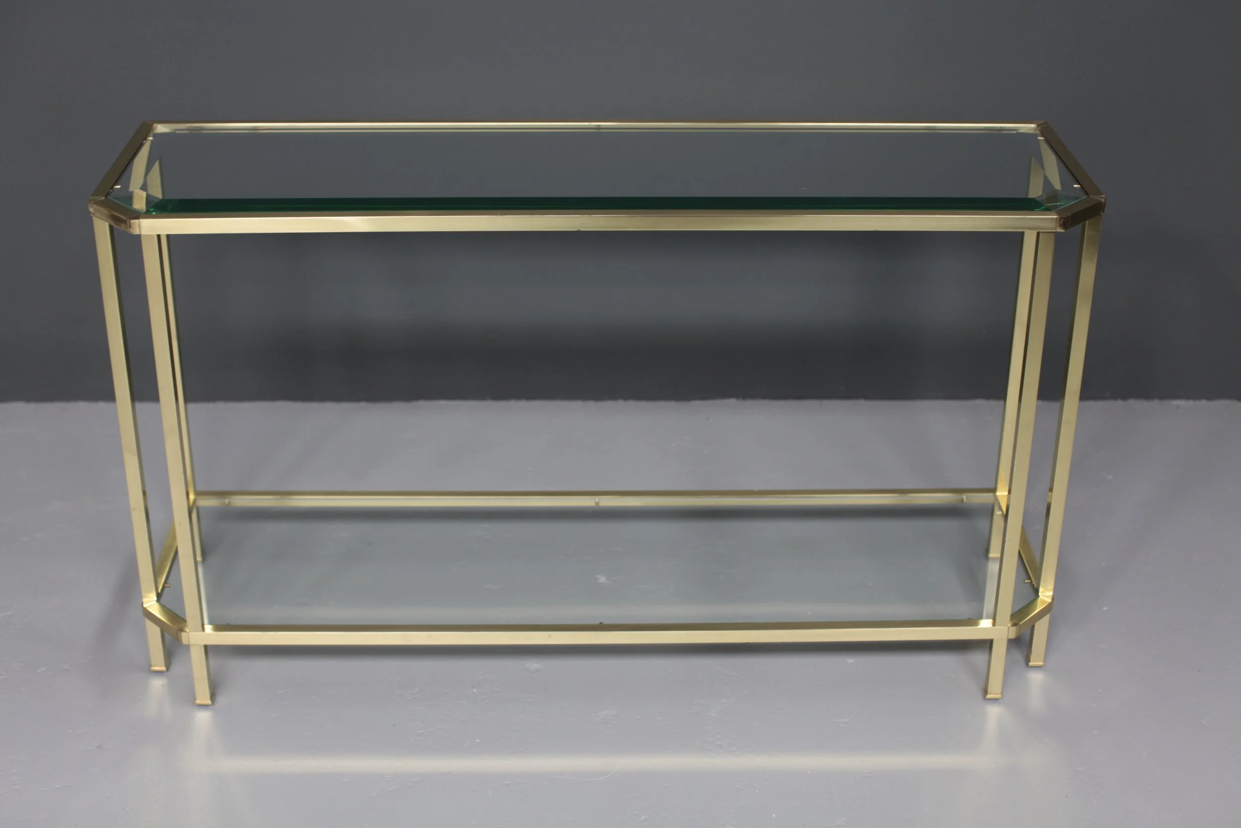 French brass and glass two-tier console table in Maison Jansen style, 1970s, original patina